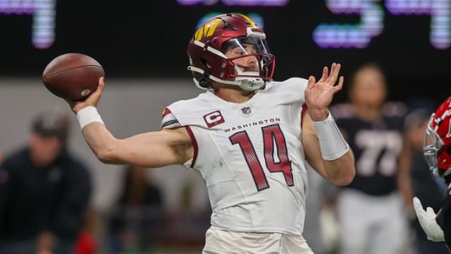 Oct 15, 2023; Atlanta, Georgia, USA; Washington Commanders quarterback Sam Howell (14) throws a pass against the Atlanta Falcons in the first quarter at Mercedes-Benz Stadium.